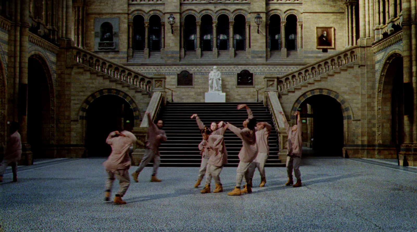 a group of people standing in front of a building