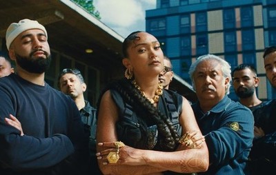 a group of people standing in front of a building