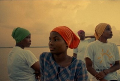 a group of people sitting on top of a boat