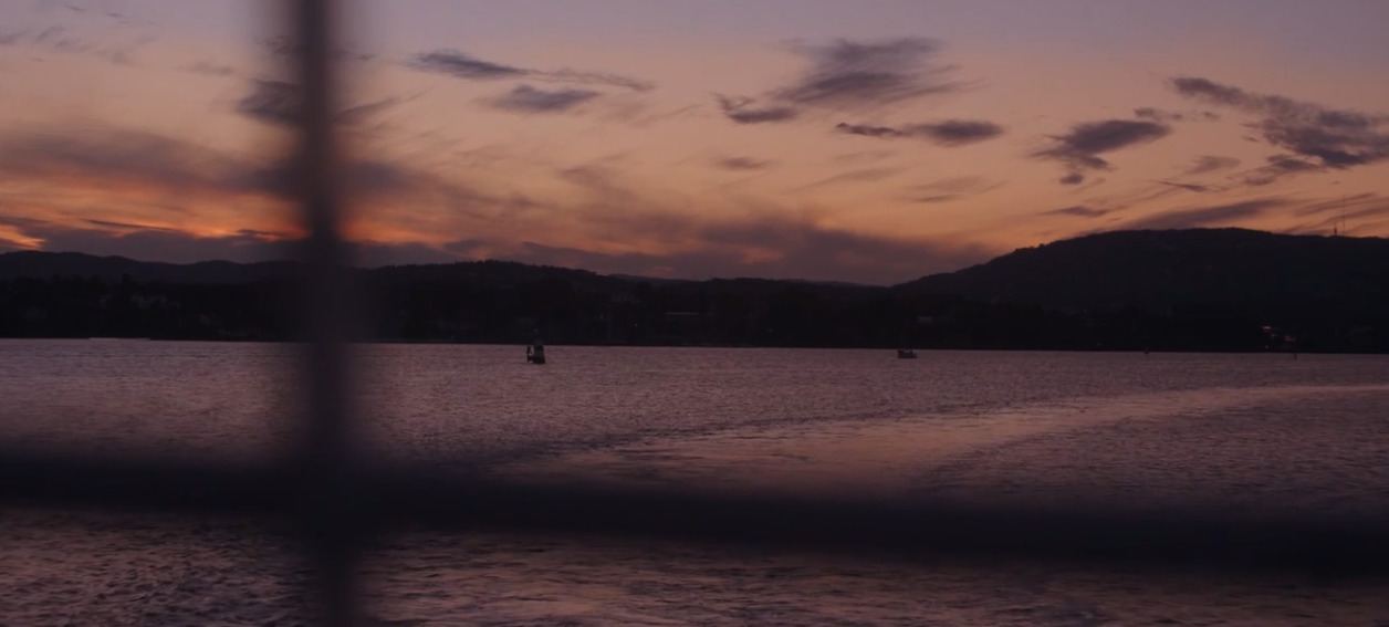 a boat traveling across a large body of water