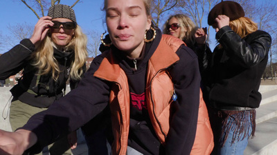 a group of women standing next to each other