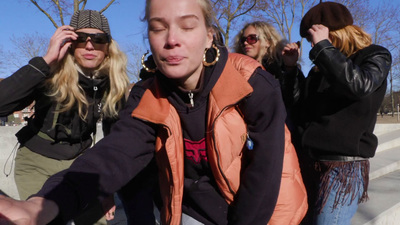 a group of women standing next to each other