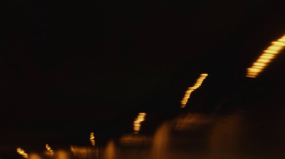 a blurry photo of a street light at night