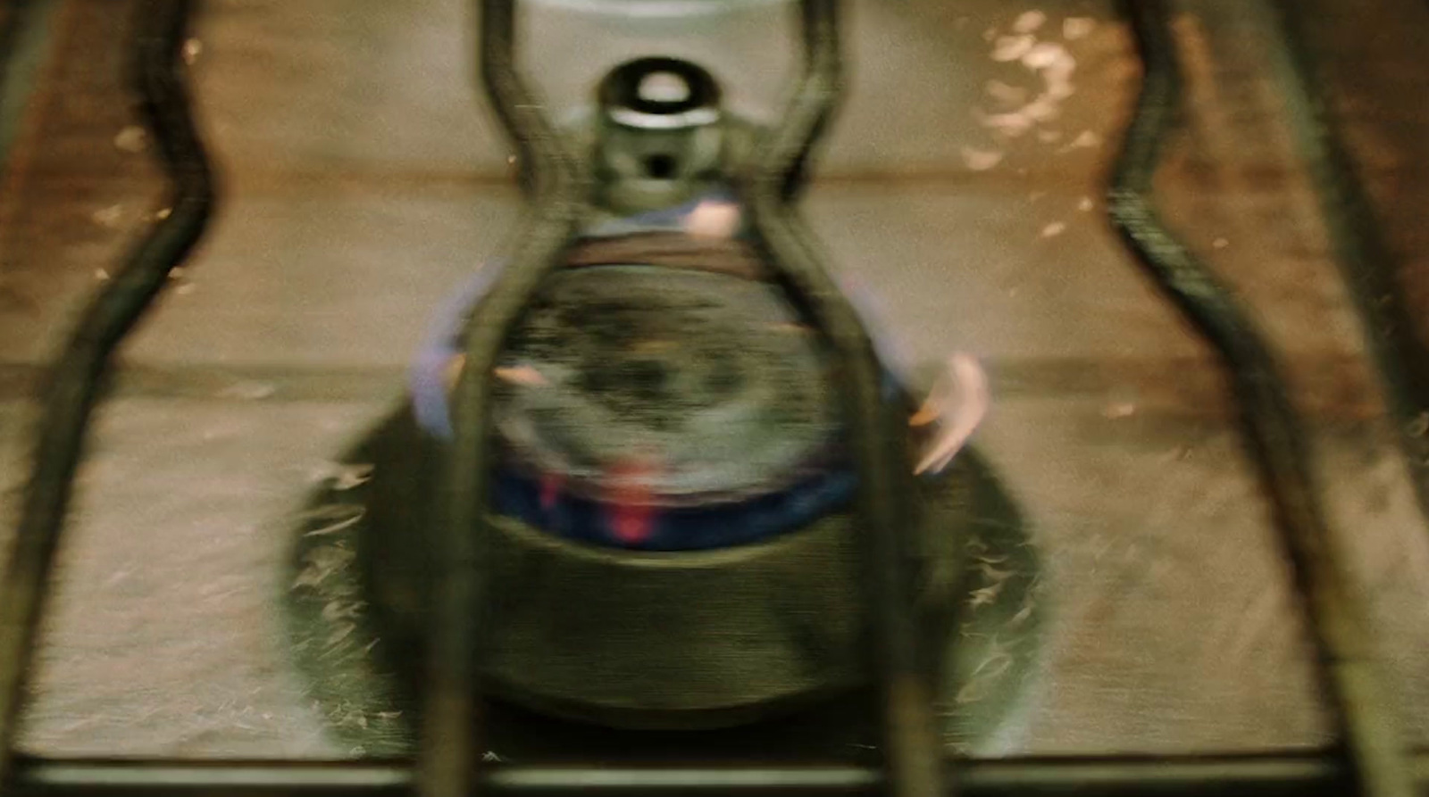 a close up of a metal object with a blurry background