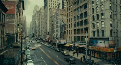 a city street filled with lots of tall buildings