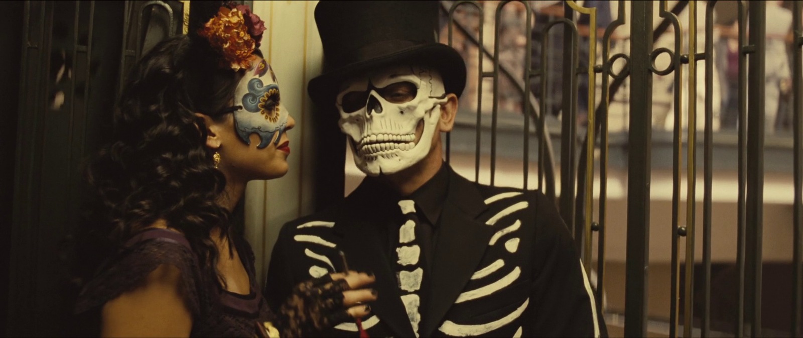 a couple of people that are dressed up in skeleton costumes