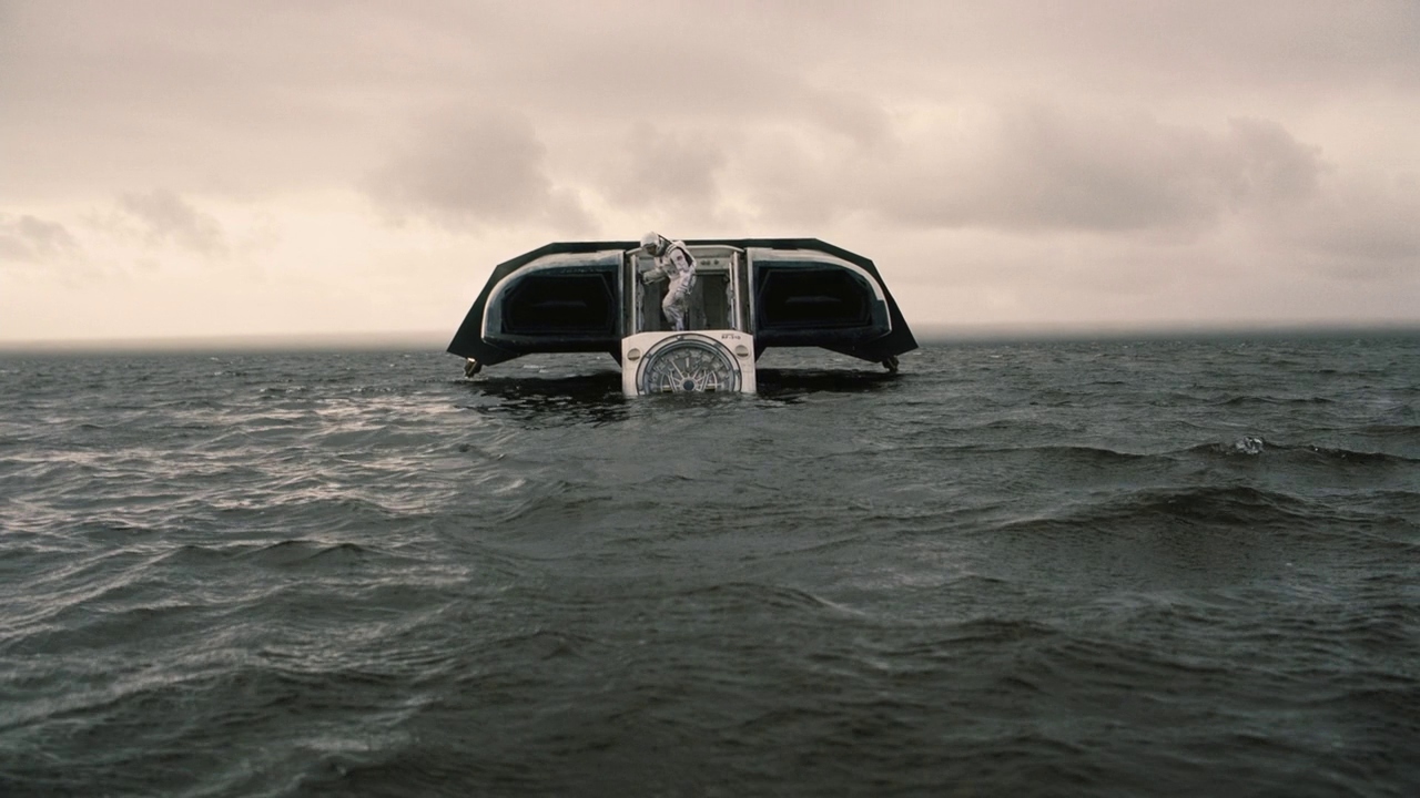 a boat floating on top of a large body of water