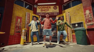 a group of men standing in front of a store