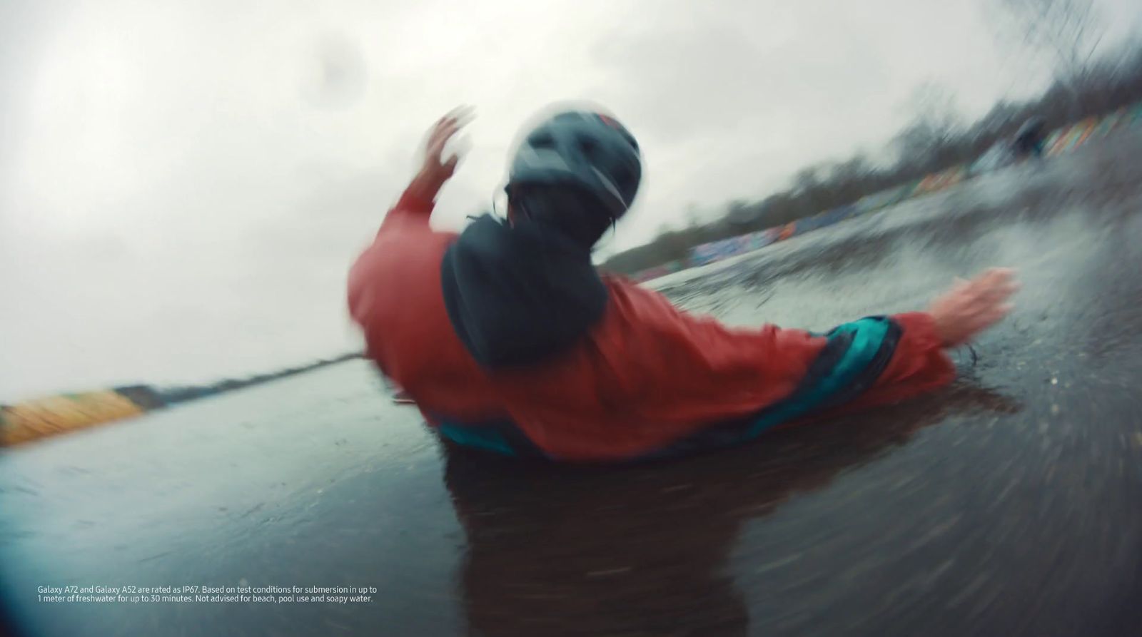 a blurry photo of a person on a surfboard in the water