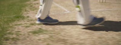 a close up of a person's legs and shoes