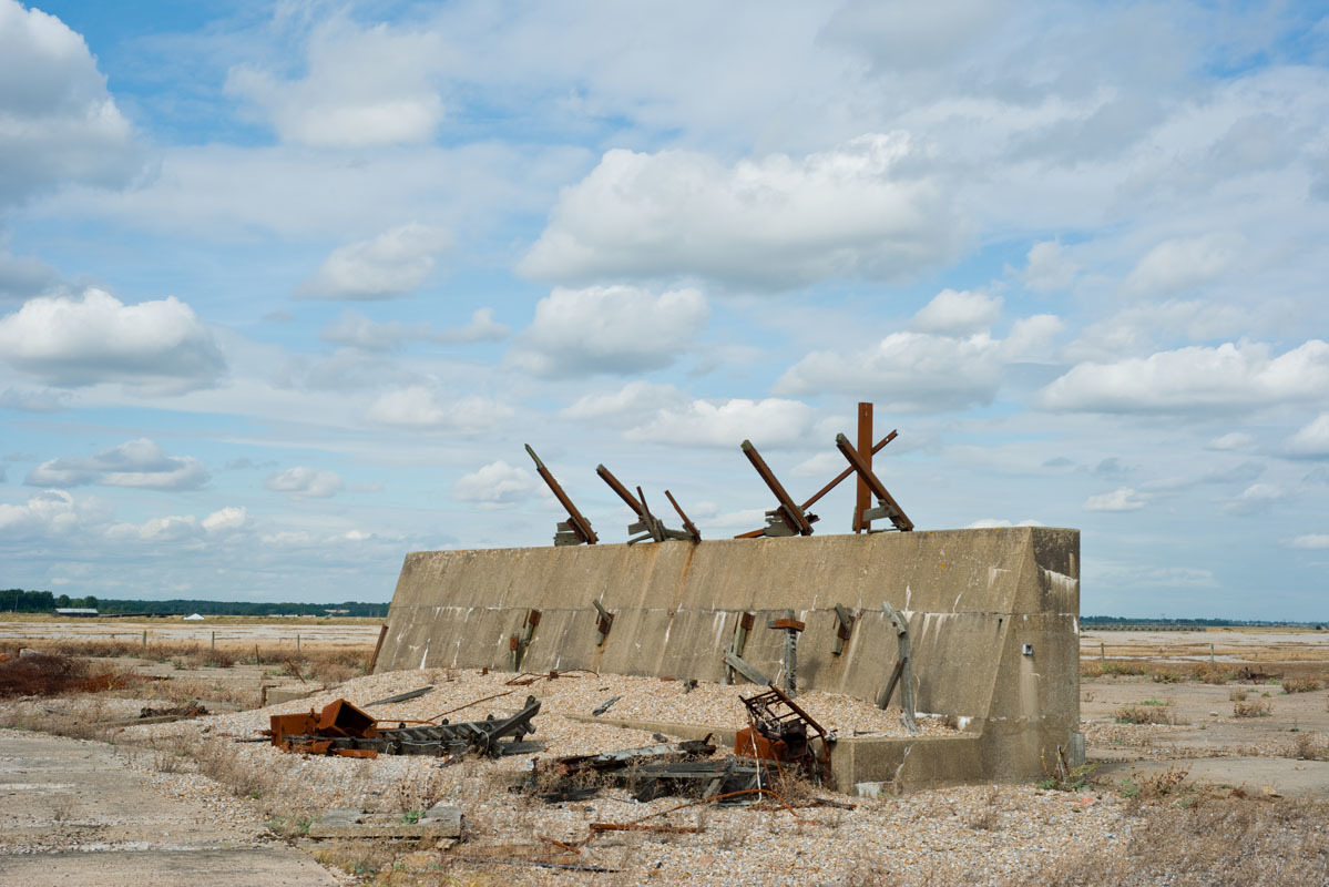 a concrete structure sitting in the middle of a desert