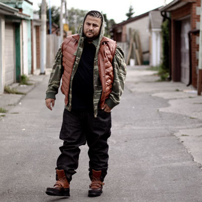 a man standing on the side of a street