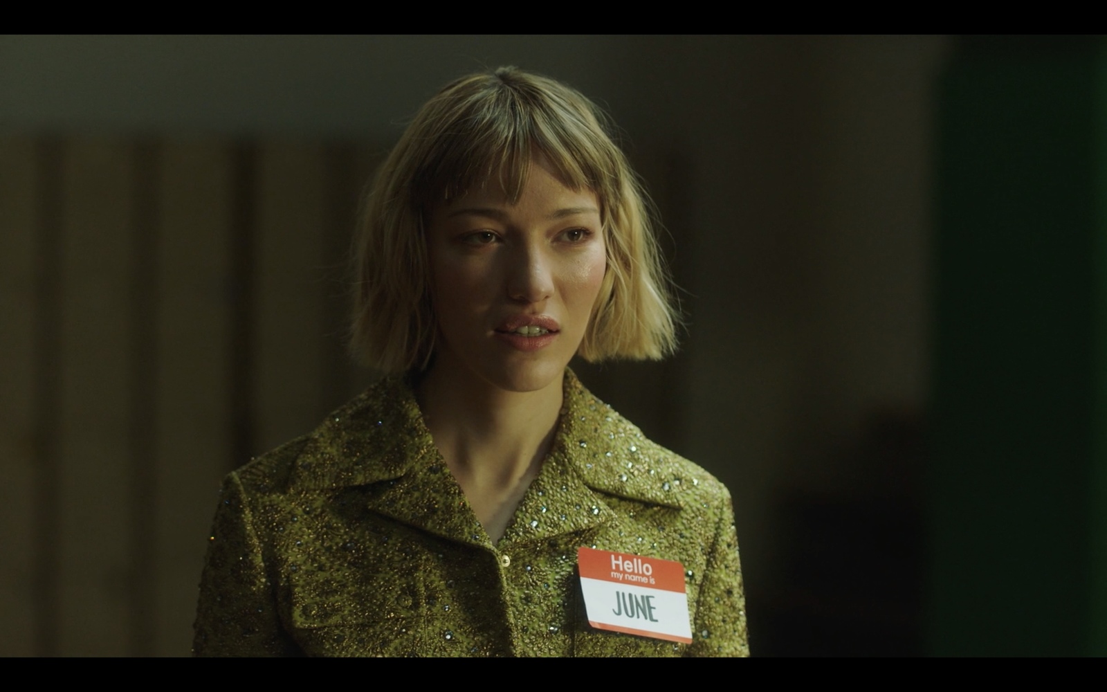 a woman with a name tag on her shirt