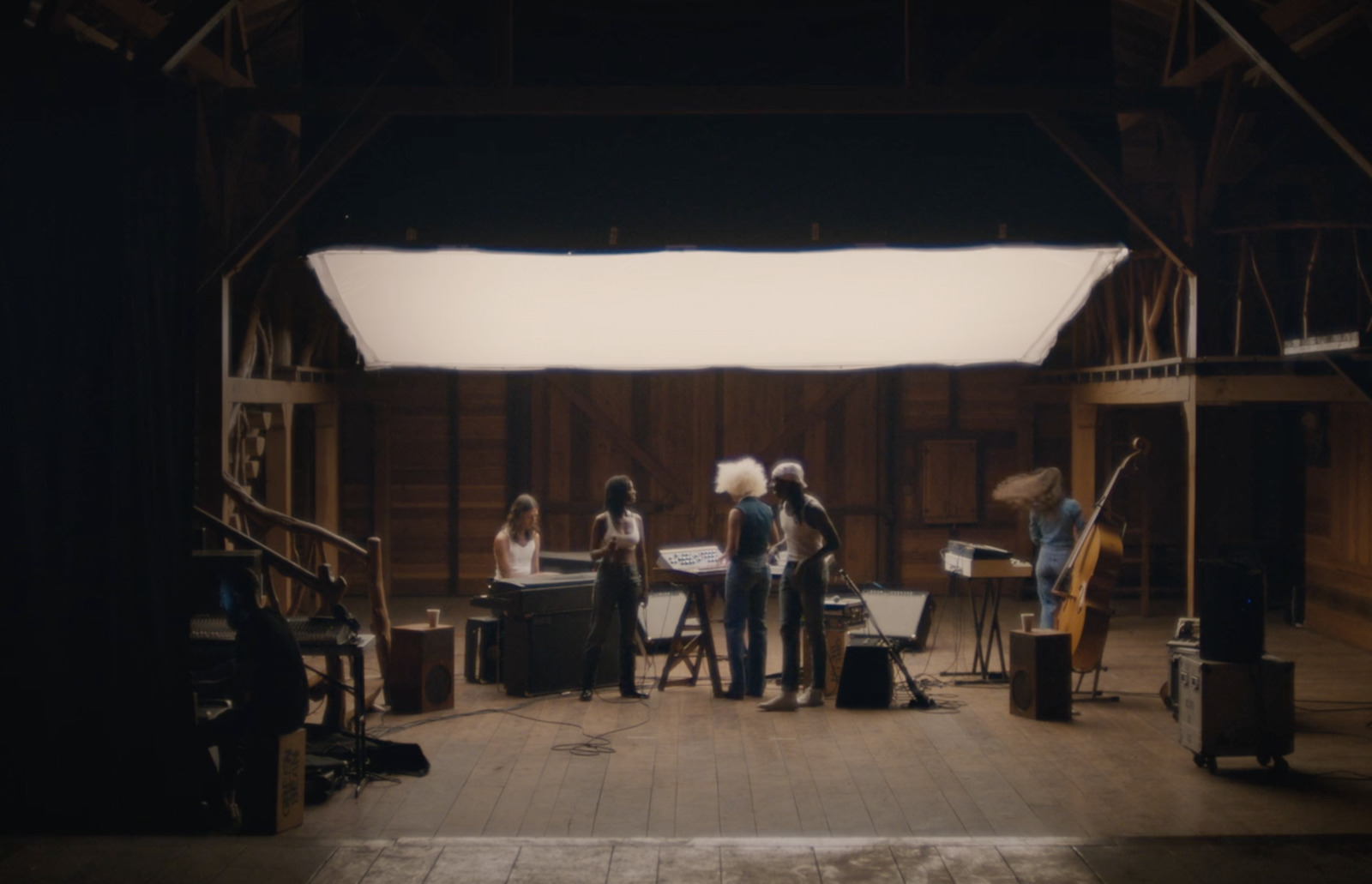 a group of people standing on a stage