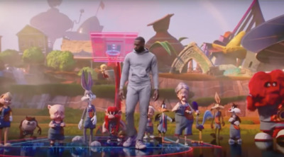 a man standing on top of a stage surrounded by cartoon characters