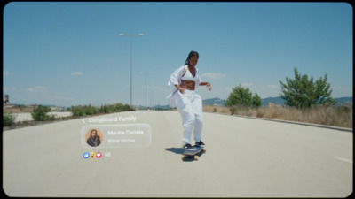 a man riding a skateboard down a street