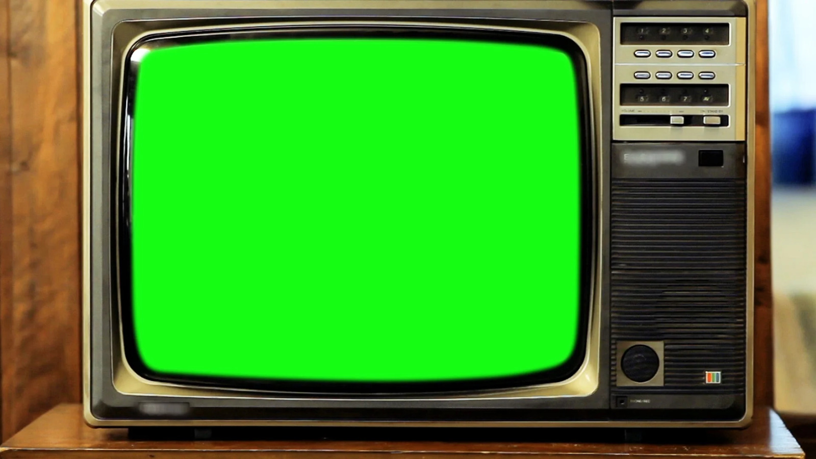 an old fashioned television with a green screen