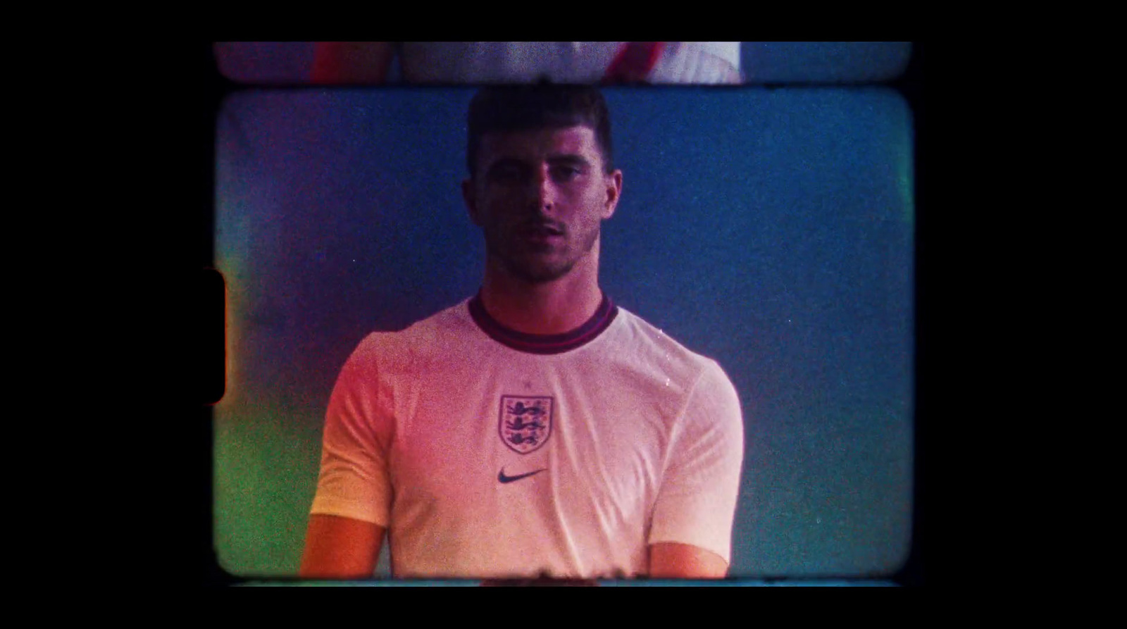 a man standing in front of a soccer ball