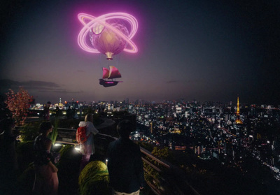 a group of people standing on top of a tall building