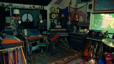 a room filled with lots of musical equipment