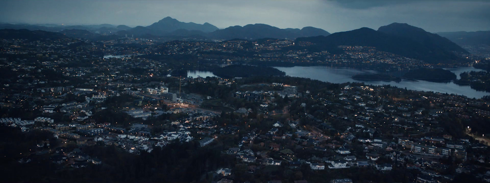 an aerial view of a city at night