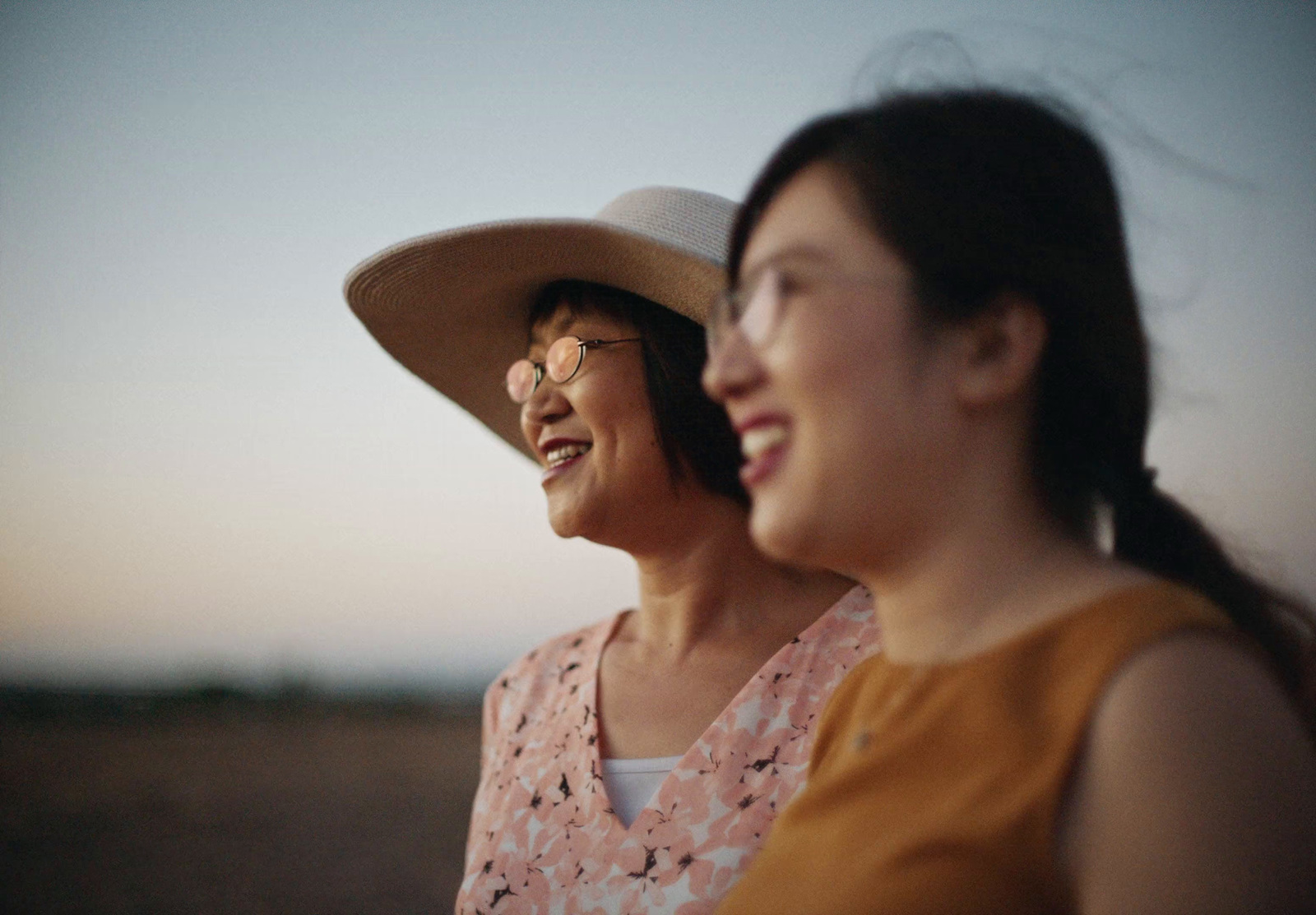 a couple of women standing next to each other