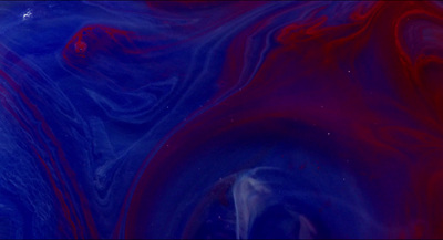 a blue and red swirl with a white background