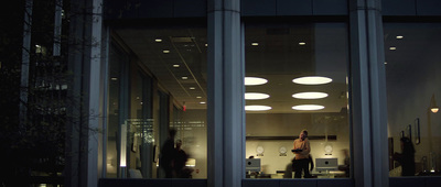 a person standing in a room with lights on