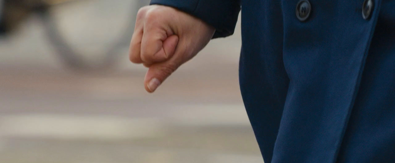 a close up of a person's hand holding something