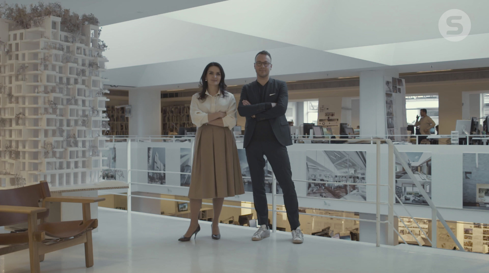 a man and a woman standing in a room