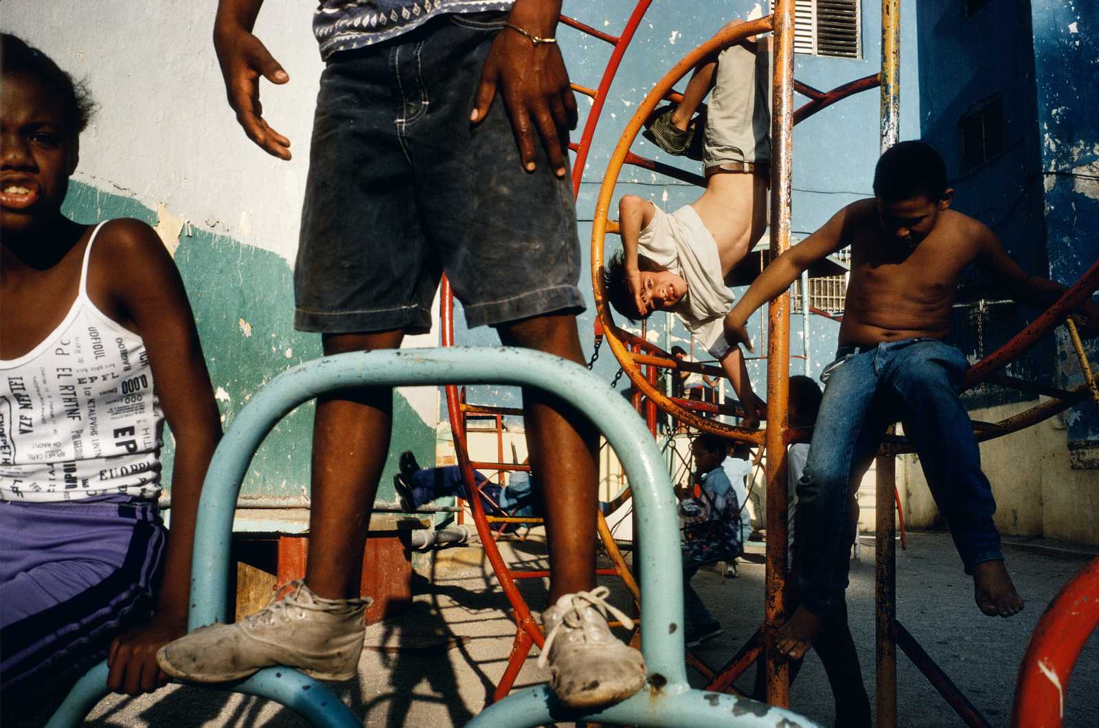 a group of children playing on a playground