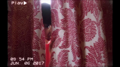 a close up of a red and white curtain