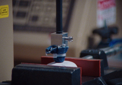 a close up of a lego robot on a table