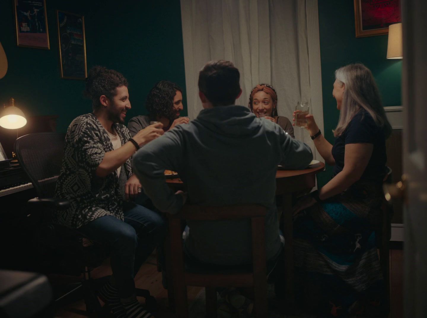 a group of people sitting around a table