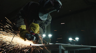 a welder working on a piece of metal