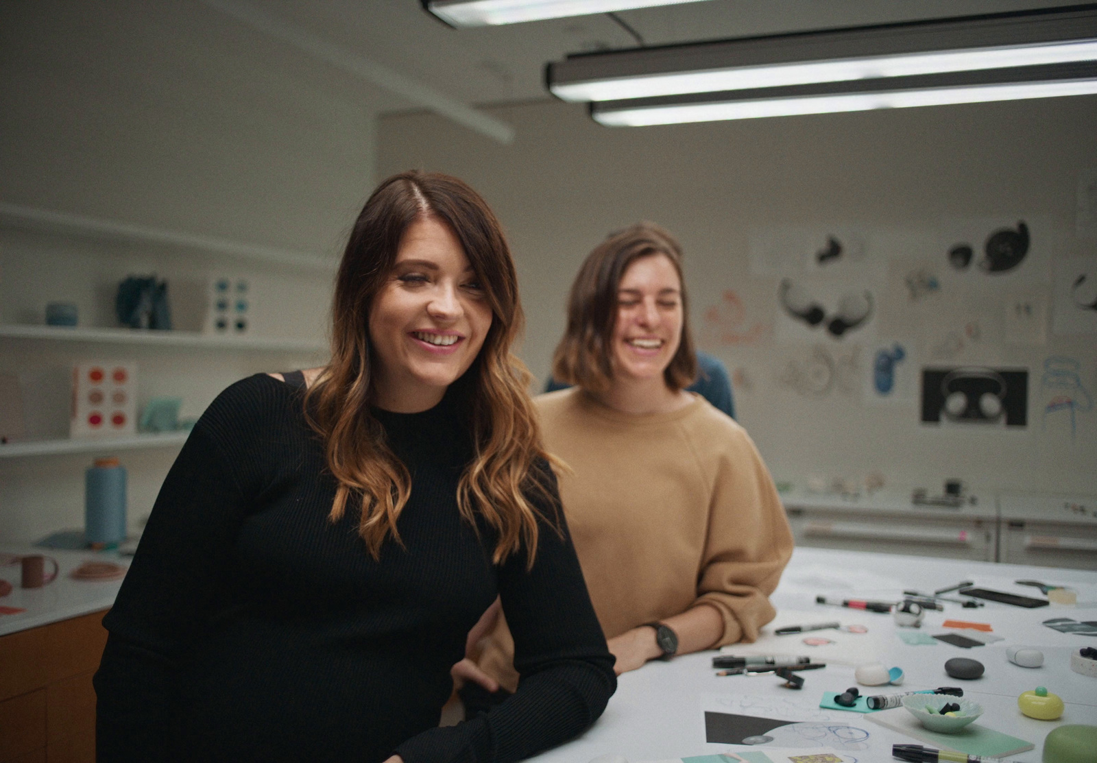 a couple of women standing next to each other