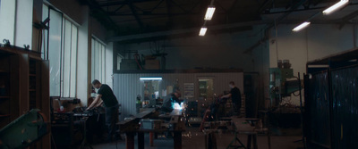 a group of people working in a factory