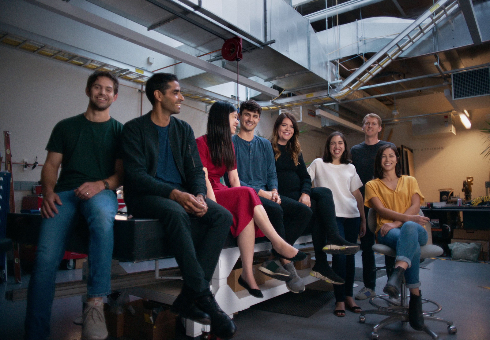 a group of people sitting in a room