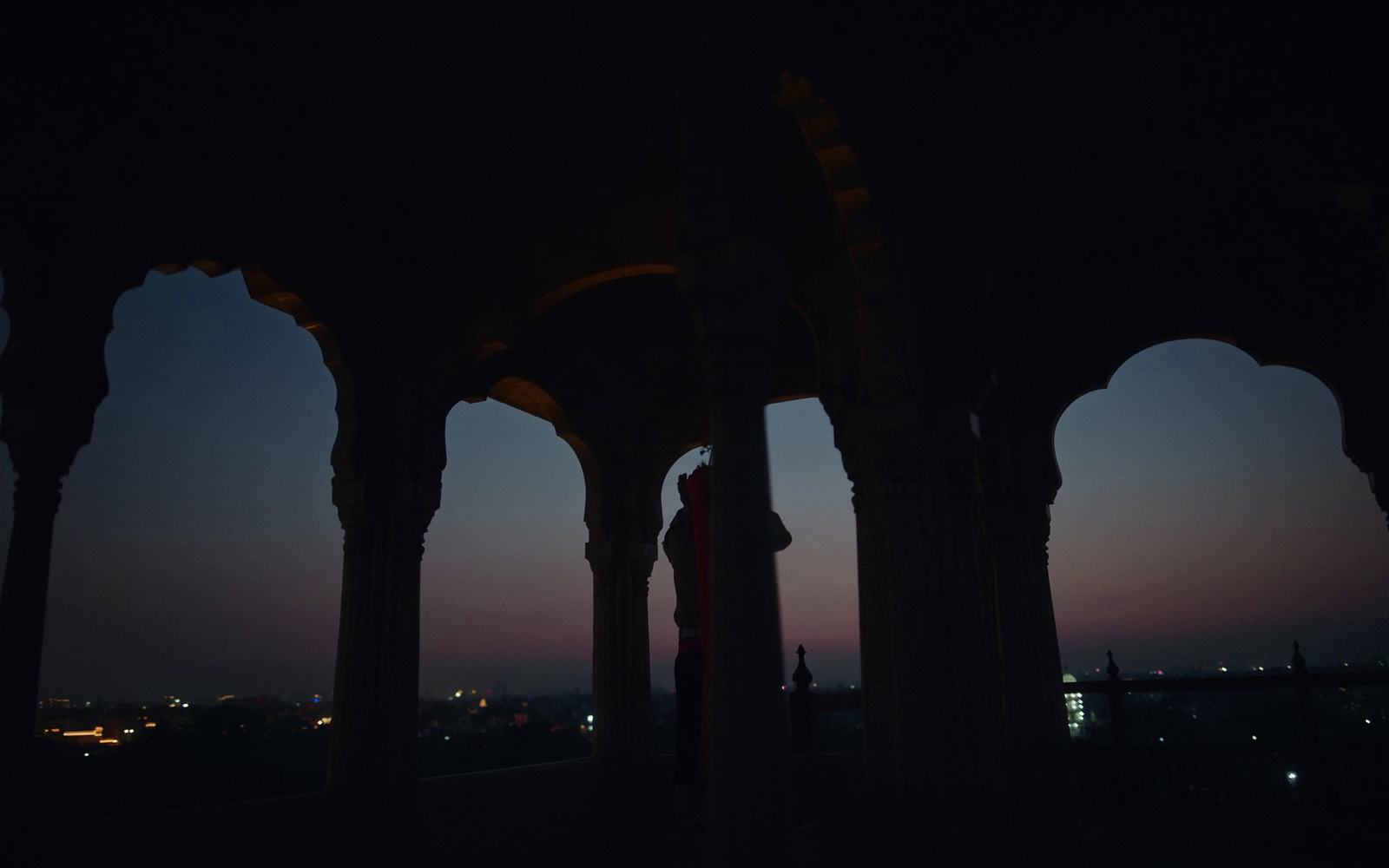 a view of a city from a building at night