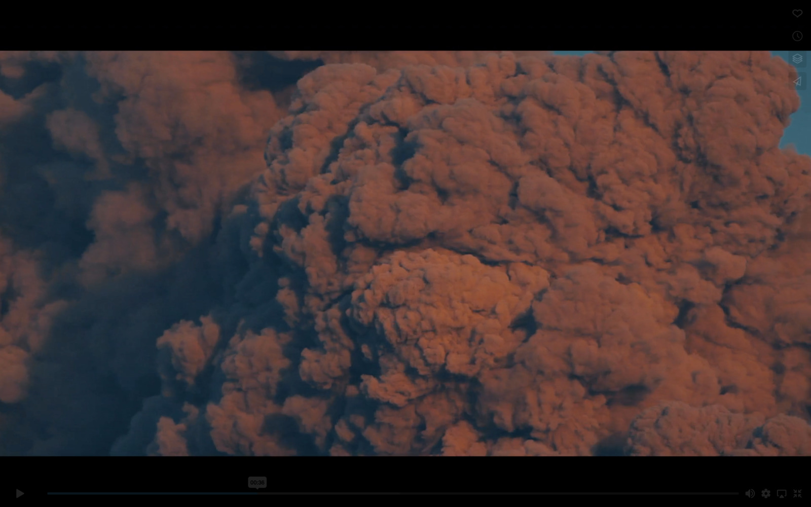 a large cloud of smoke and steam rising from the ground