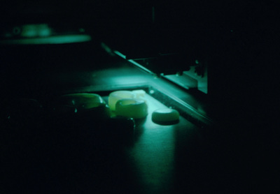 a pair of glasses sitting on top of a table