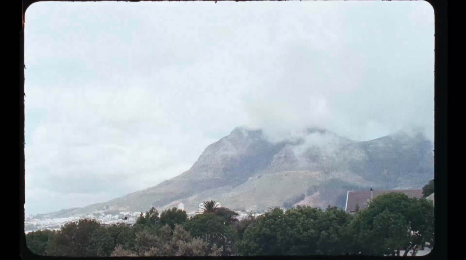 a view of a mountain from a distance