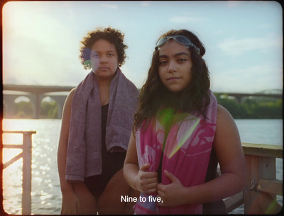 a couple of women standing next to each other