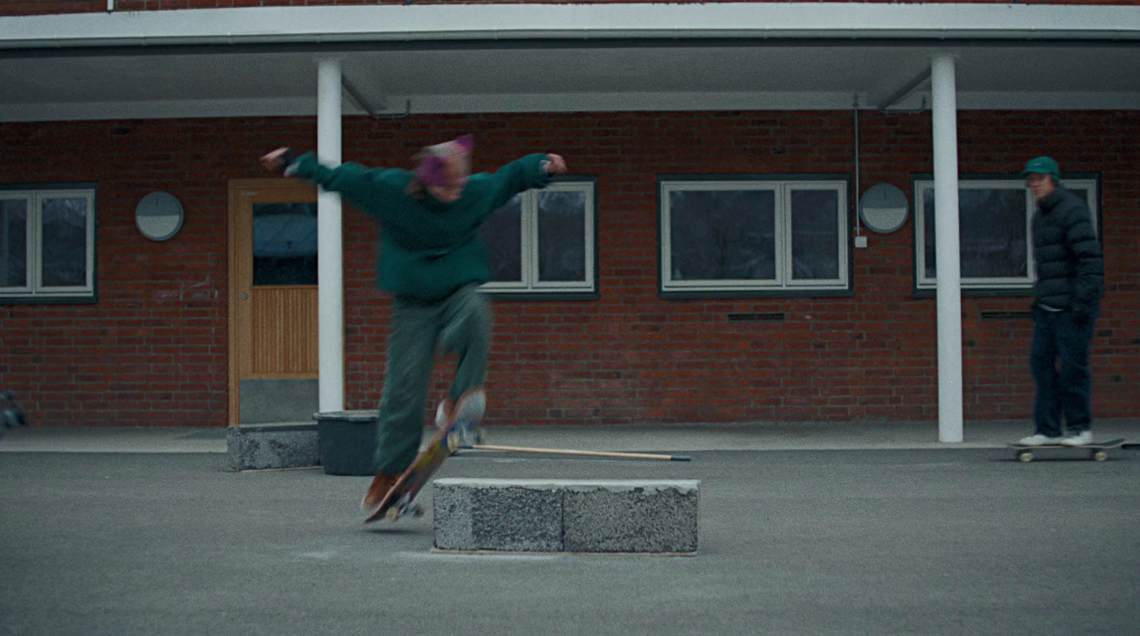 a man is doing a trick on a skateboard