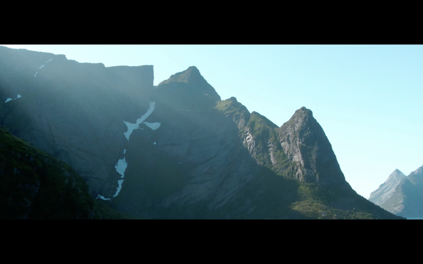 a view of a mountain range from a distance