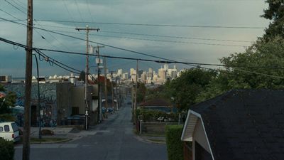 a view of a city from an alley way