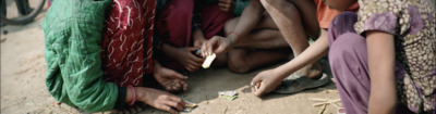 a group of people sitting around each other