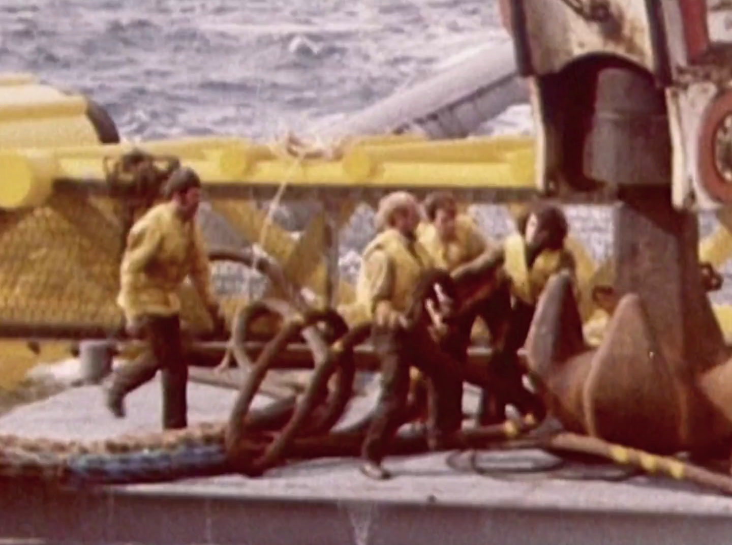 a group of people on a boat in the water