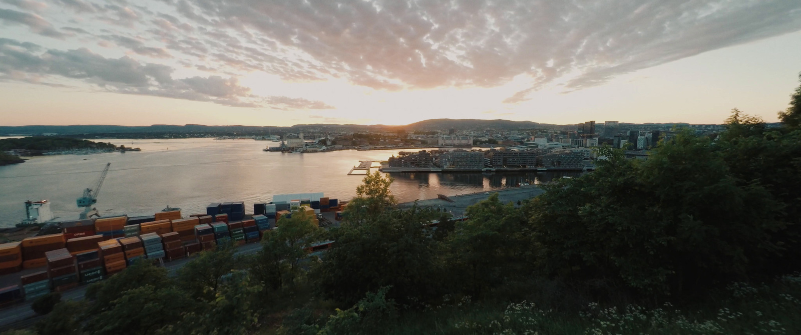 a view of a city at sunset