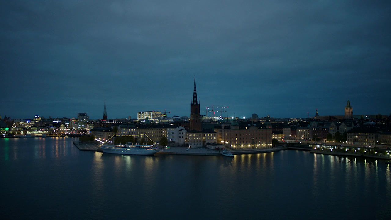 a view of a city at night from across the water